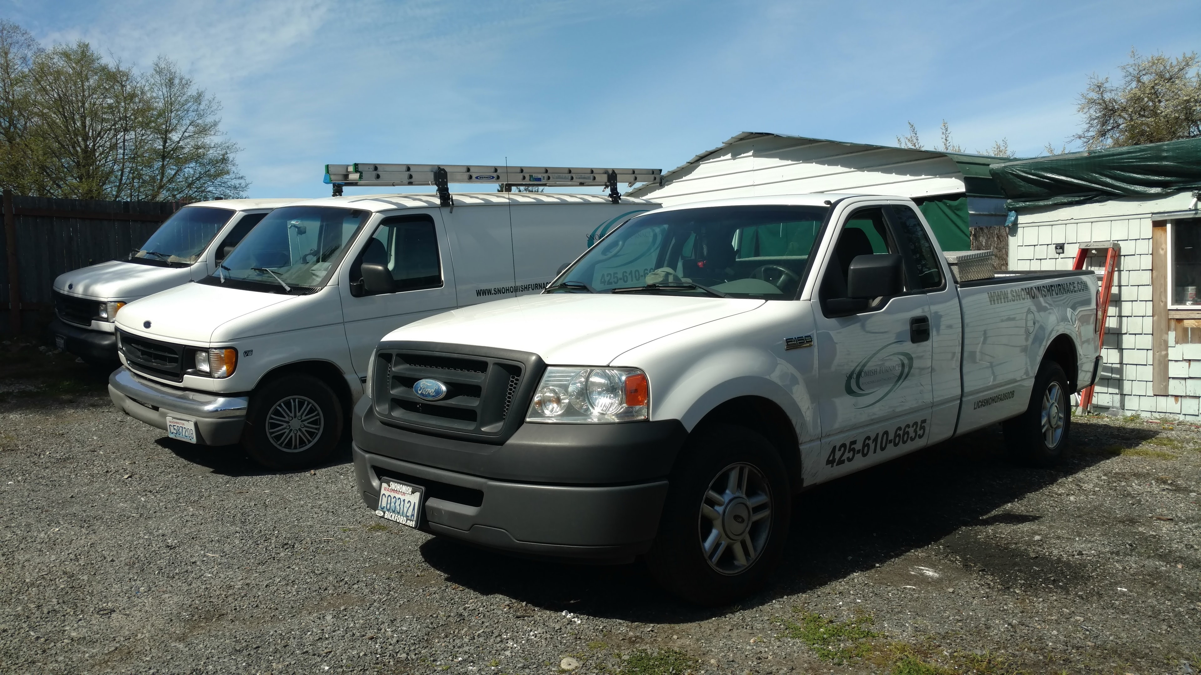 Snohomish Furnace & Air service fleet — Ford F-150 truck and cargo van with company branding, Snohomish County WA